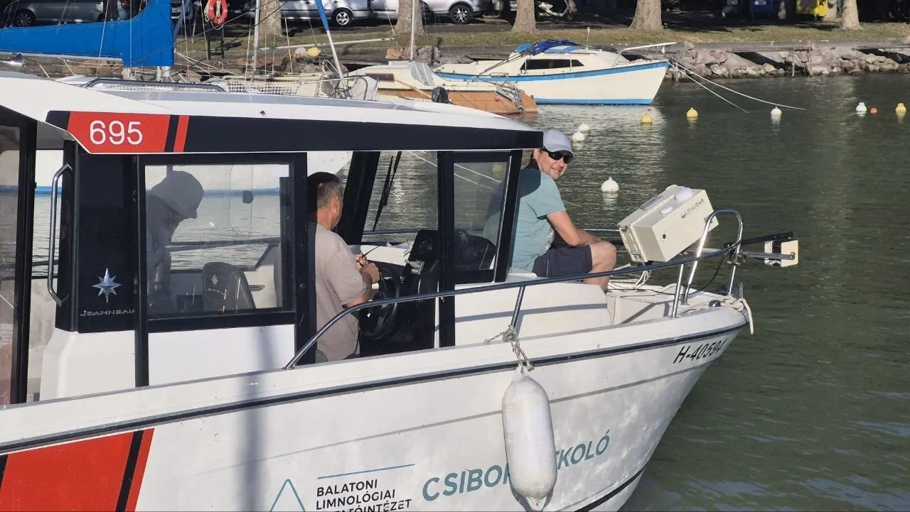 The LIFL-11 on the bow rail of the Balaton Limnological Research Institute boat, in the harbour among moored sailing boats