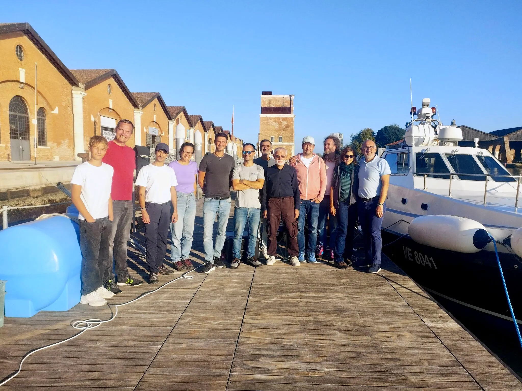 The LIFeLiDAR field team on the dock at the Venice lagoon during the ESA PHY2FLEX campaign, the survey vessel moored alongside